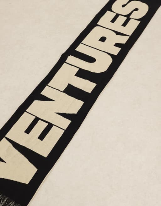 ASOS DESIGN knitted reversible graphic scarf in black