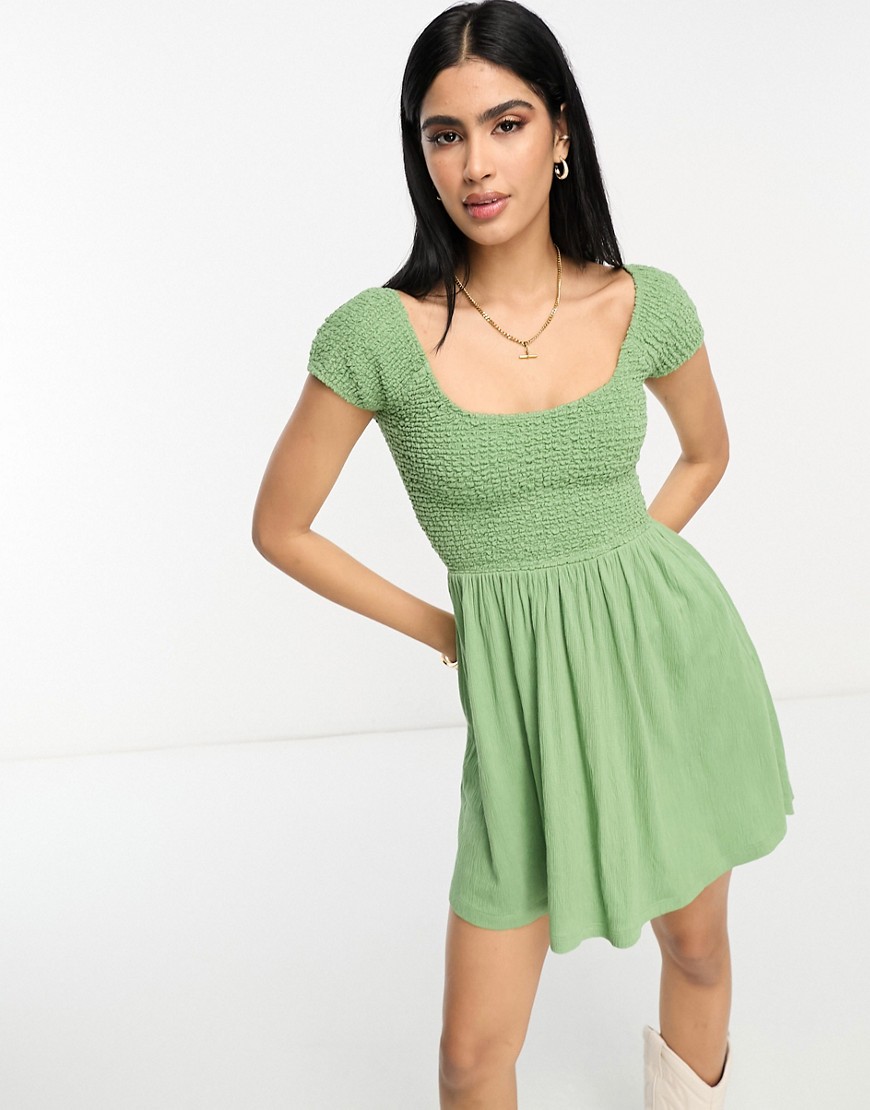 ASOS DESIGN scoop neck cap sleeve crinkle shirred mini dress in light khaki-Green