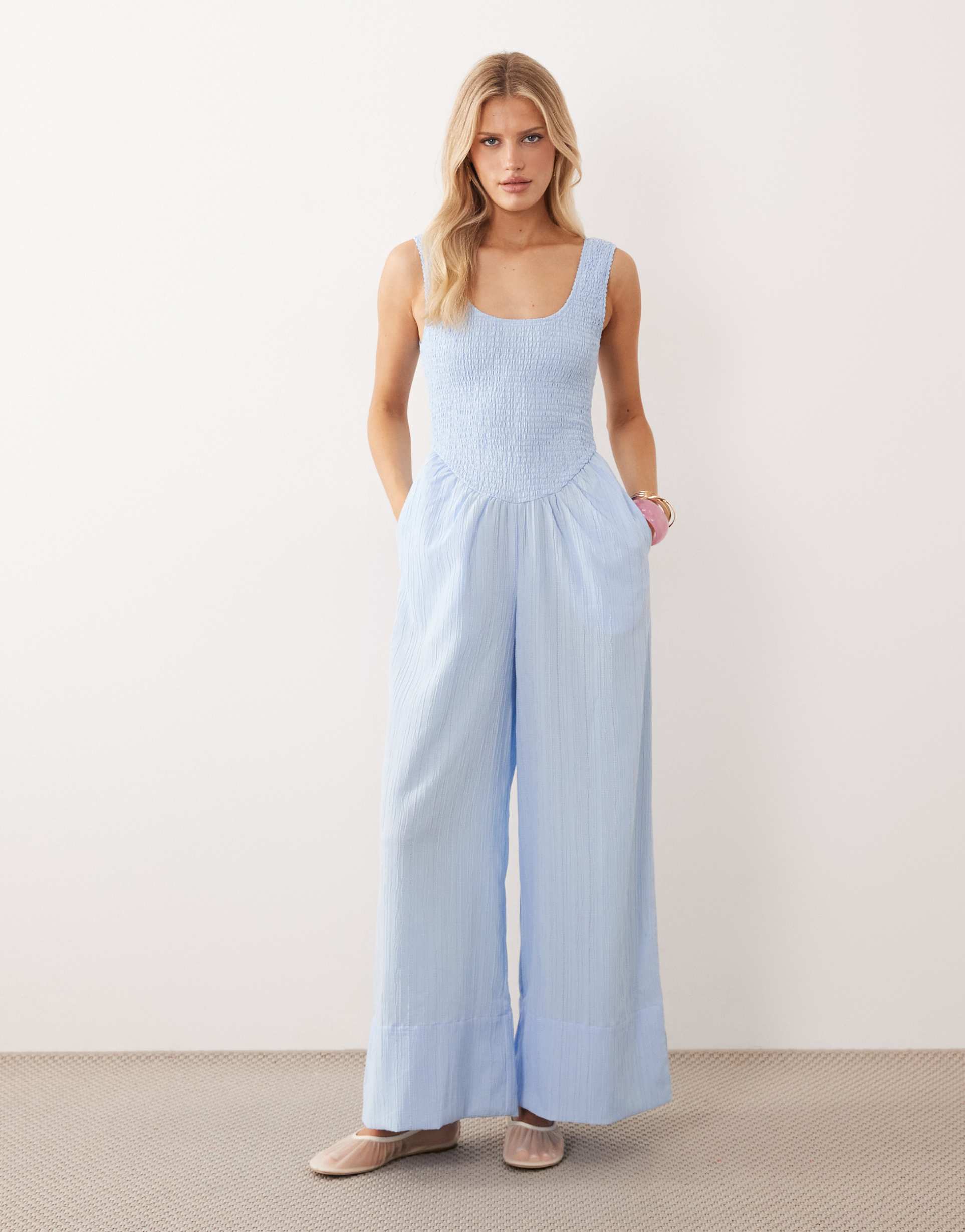 asos design scoop neck crinkle jumpsuit in pale blue