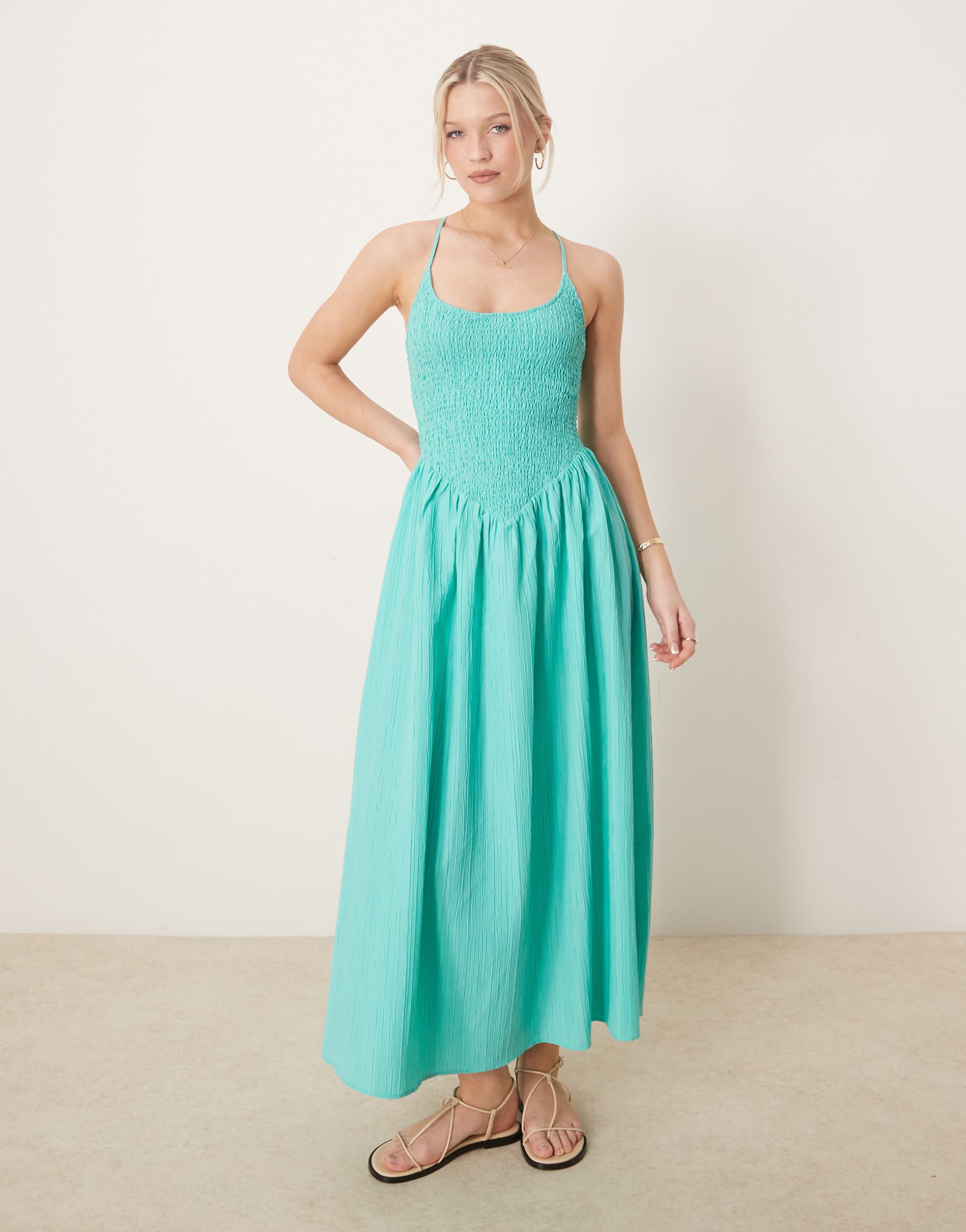 asos design scoop neck crinkle maxi dress with cross back in aqua blue