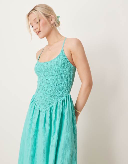 ASOS DESIGN scoop neck crinkle maxi dress with cross back in aqua blue