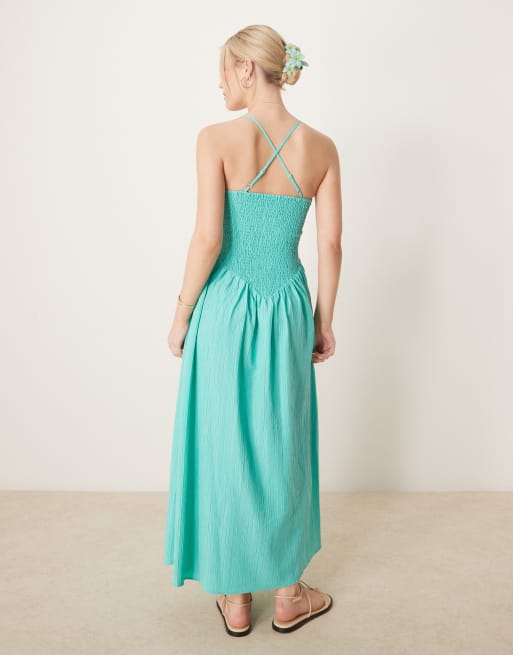 ASOS DESIGN scoop neck crinkle maxi dress with cross back in aqua blue