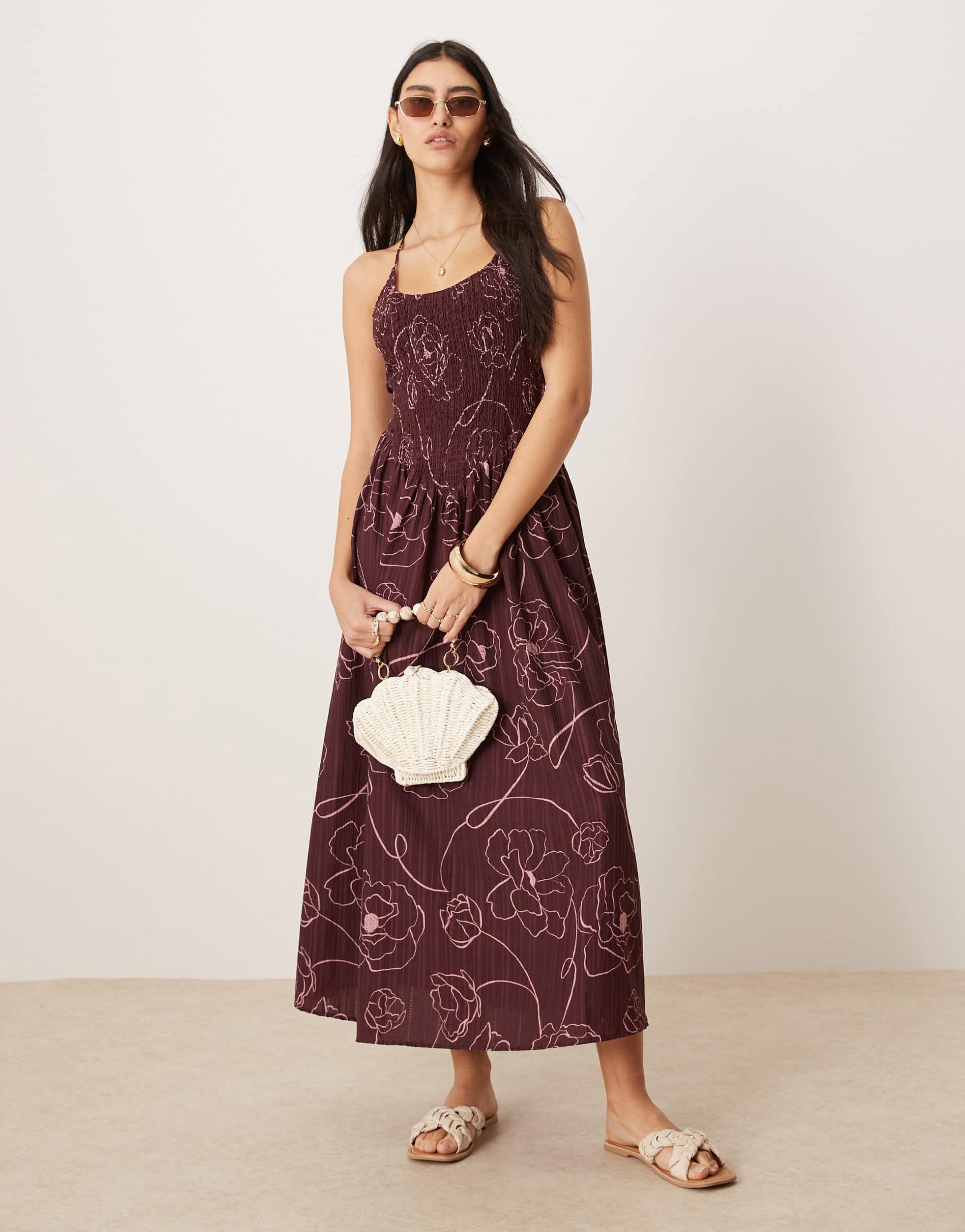 asos design scoop neck crinkle maxi dress with cross back in burgundy floral print