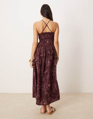 ASOS DESIGN scoop neck crinkle maxi dress with cross back in burgundy floral print