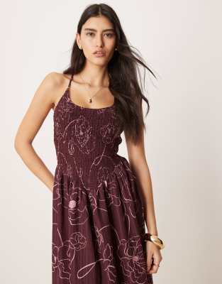 ASOS DESIGN scoop neck crinkle maxi dress with cross back in burgundy floral print