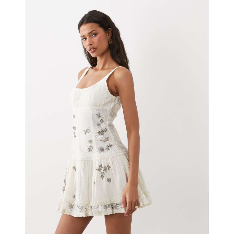 ASOS DESIGN scoop neck mini dress with sheer lace panels and floral  embellishment in antique white | ASOS