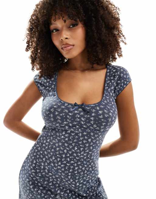 ASOS Design Scoop Neck Pointelle Mini Dress with Bow Detail in Washed Navy Ditsy print Multi