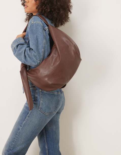 ASOS DESIGN scoop sling shoulder bag with knot detail in brown - view 1