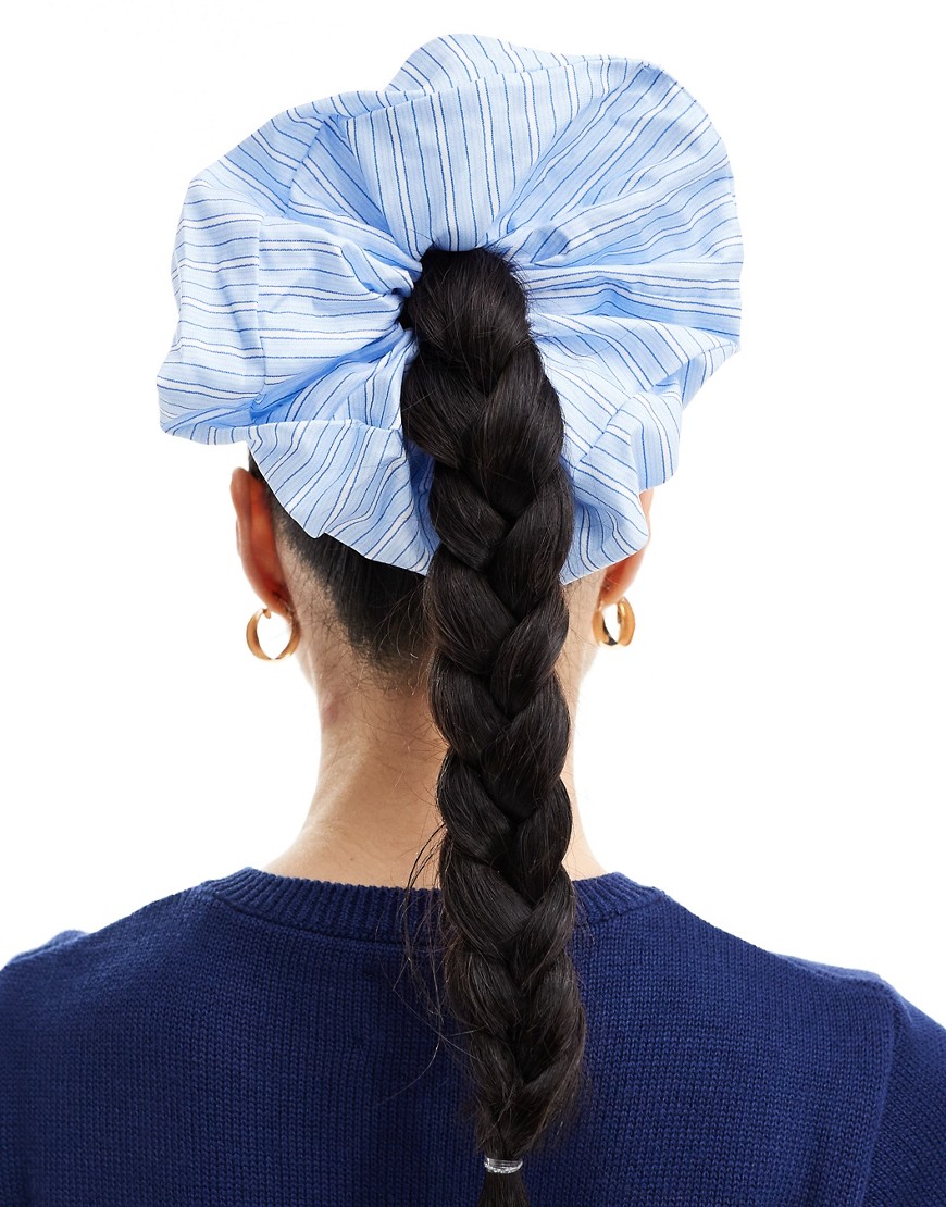 ASOS DESIGN scrunchie hair tie with stripe design in blue
