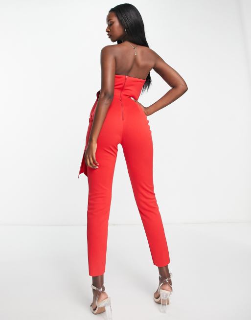 Red ruffles will turn heads in a bandeau jumpsuit.