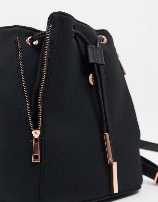 asos design laptop backpack with rose gold detail ASOS DESIGN scuba-style fabric backpack with rose gold hardware