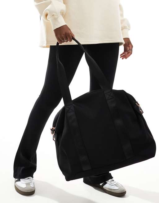 ASOS DESIGN scuba-style fabric holdall weekend bag in black, 2 of 4