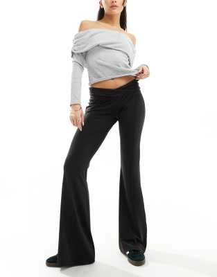 Bershka folded waistband flared pants in black