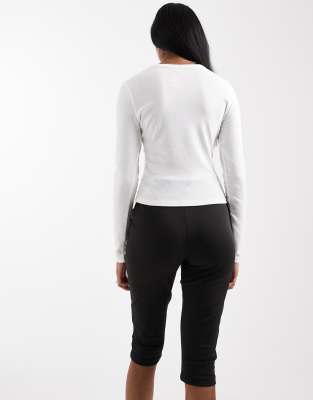 Asos Design Sculpting Capri Leggings In Black