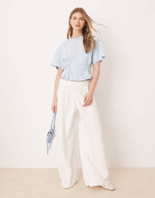 ASOS DESIGN seam detail short sleeve corset waist t-shirt in baby blue
