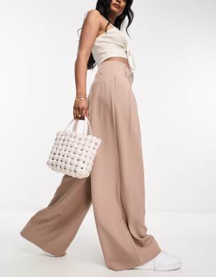 ASOS DESIGN seamed paperbag trousers with pleats in taupe