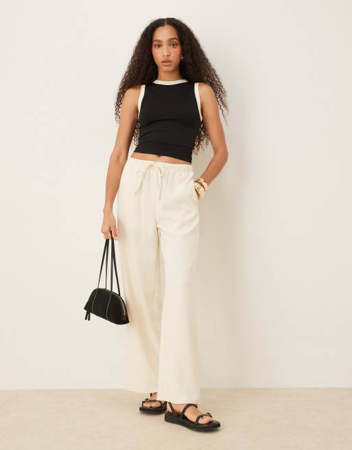 ASOS DESIGN seamless crew neck tank top with contrast trims in black