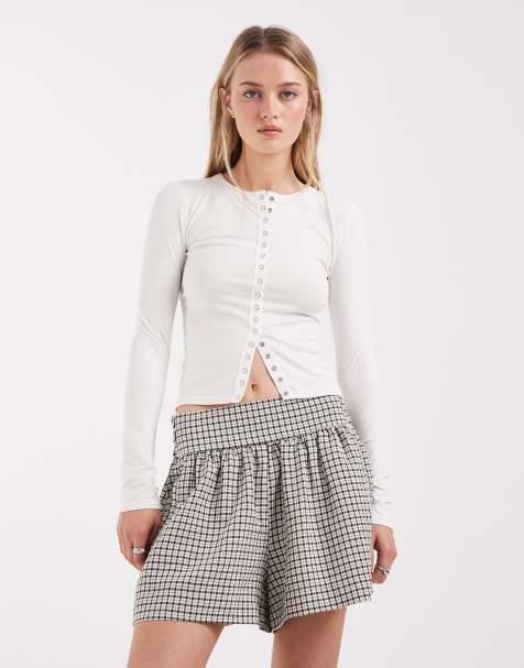 ASOS DESIGN seamless rib popper detail long sleeve top in cream