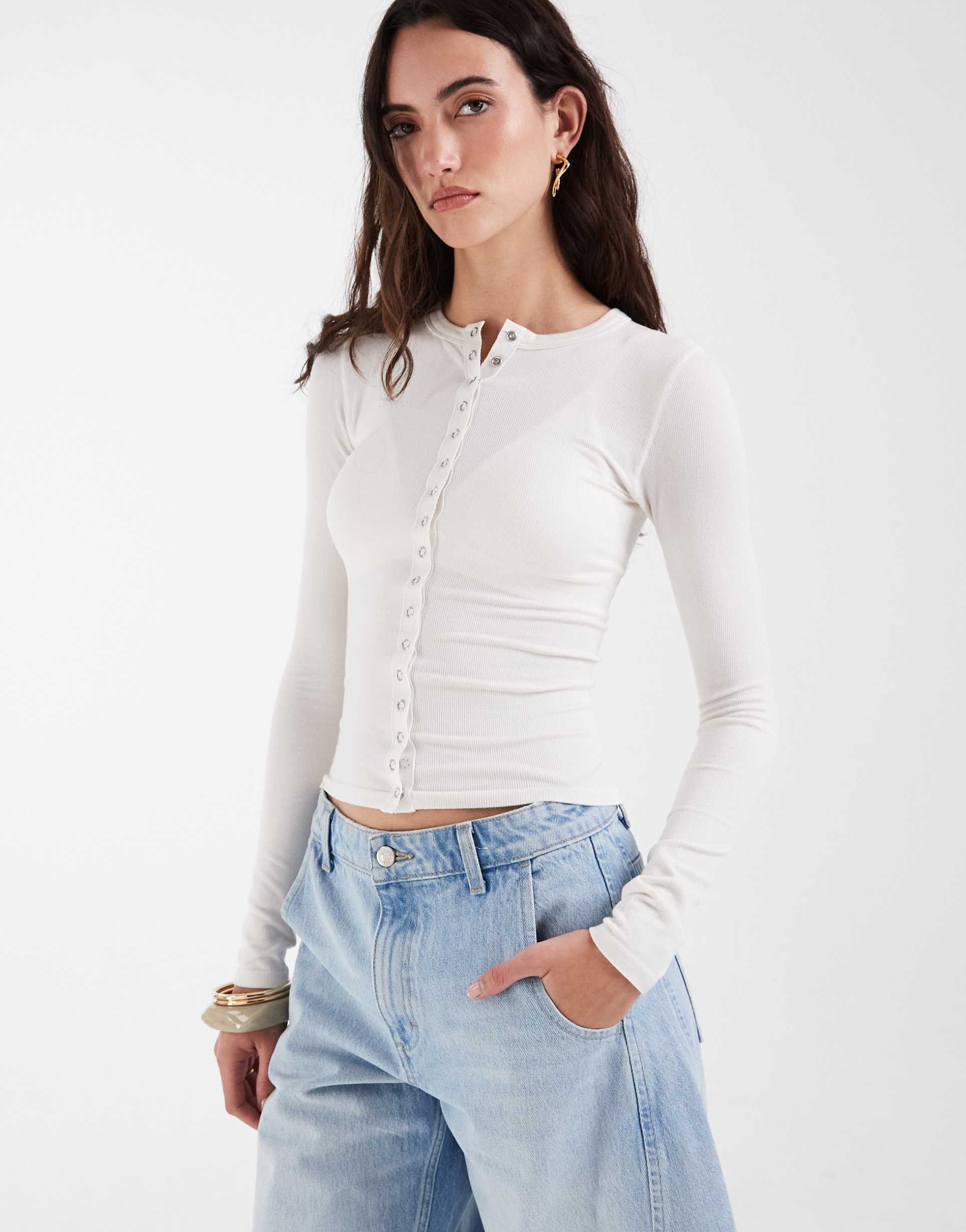 asos design seamless ribbed snap detail long sleeve top in cream