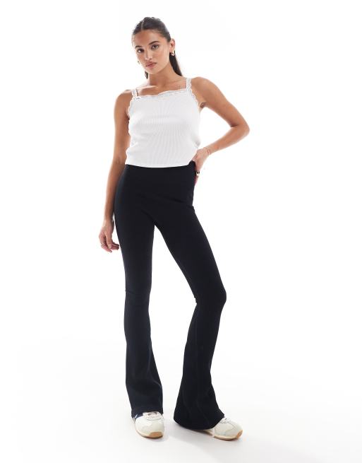 ASOS DESIGN seamless sculpting ribbed flare legging in black, 3 of 5