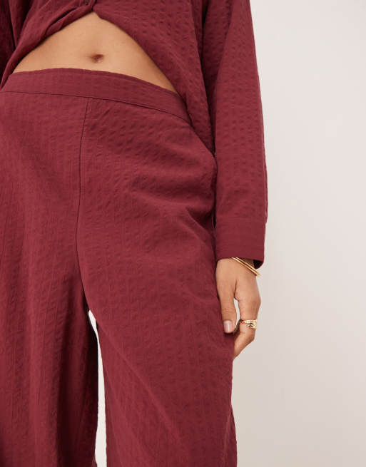 ASOS DESIGN seersucker relaxed pull on pants in burgundy - part of a set