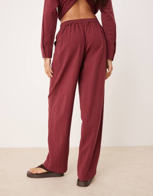 ASOS DESIGN seersucker relaxed pull on pants in burgundy - part of a set
