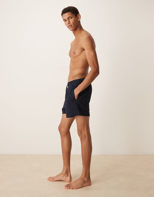 ASOS DESIGN seersucker short length swim shorts in navy, 3 of 5