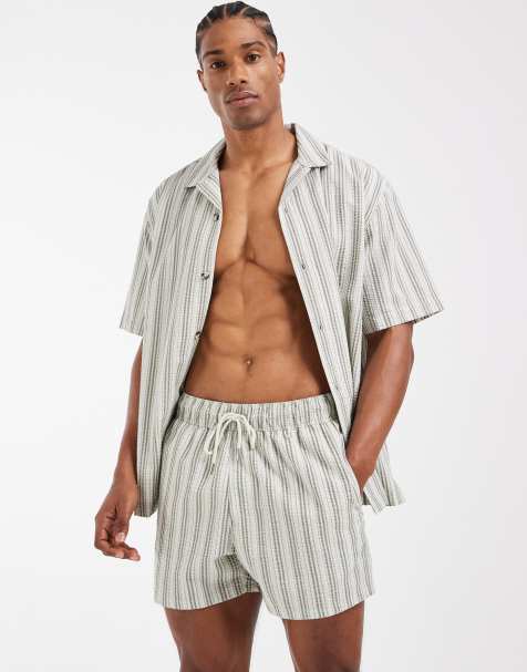 ASOS DESIGN seersucker stripe short length swim shorts in sage green (part of a set) - view 1