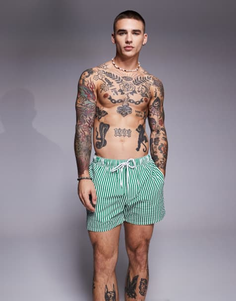 ASOS DESIGN seersucker stripe swim shorts in short length in green - view 1