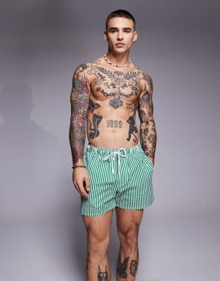 ASOS DESIGN seersucker striped swim shorts in short length in green