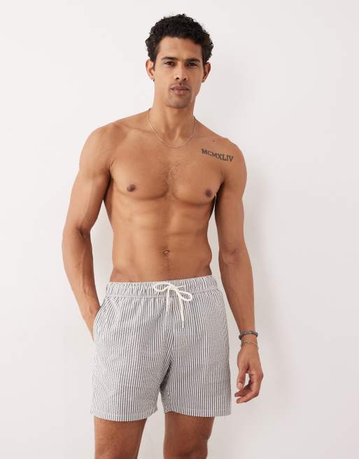 ASOS DESIGN seersucker swim shorts in mid length in black stripe, 2 of 5
