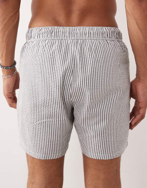 ASOS DESIGN seersucker swim shorts in mid length in black stripe, 5 of 5