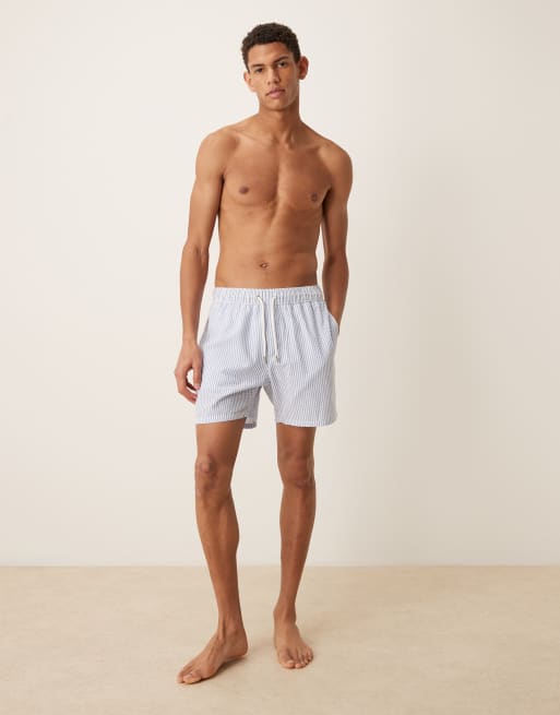 ASOS DESIGN seersucker swim shorts in mid length in blue stripe, 2 of 5