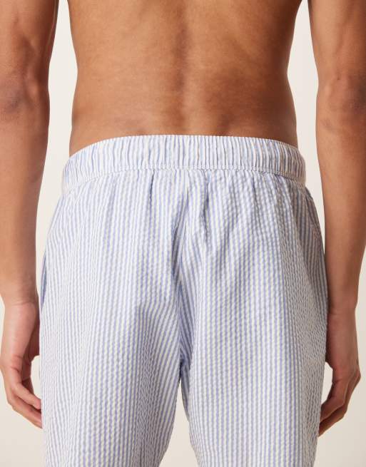 ASOS DESIGN seersucker swim shorts in mid length in blue stripe, 4 of 5