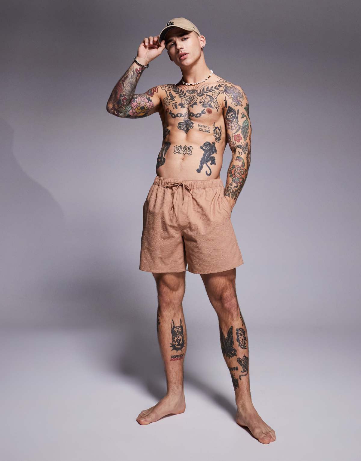 ASOS DESIGN seersucker swim shorts in mid length in brown
