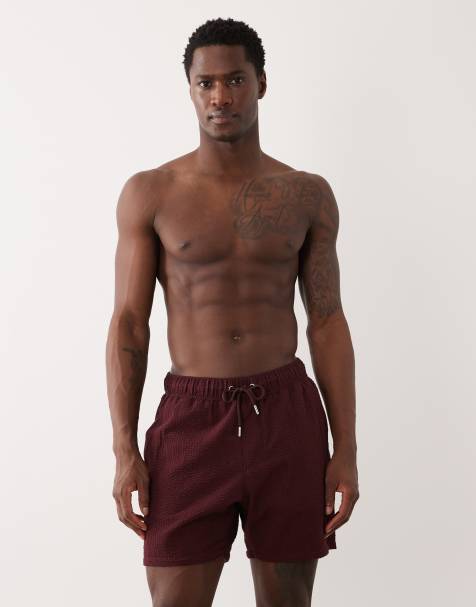 ASOS DESIGN seersucker swim shorts in mid length in burgundy - view 1