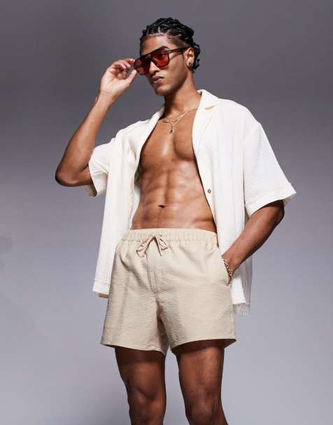 ASOS DESIGN seersucker swim shorts in short length in beige - view 1