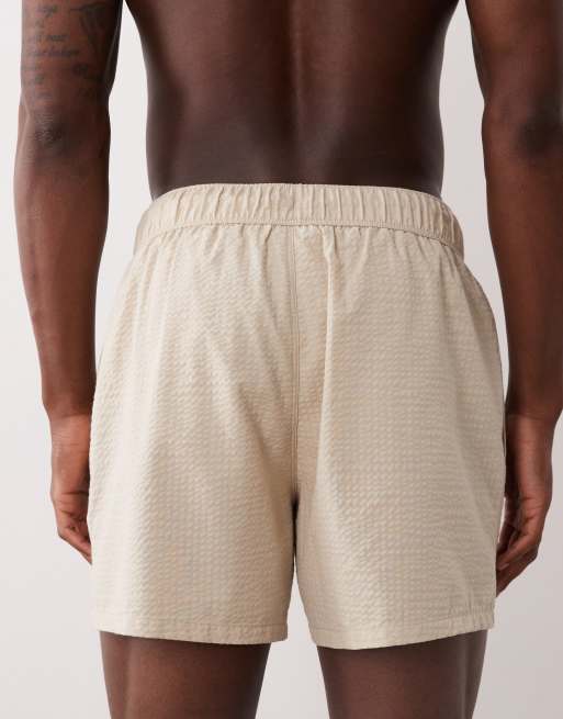 ASOS DESIGN seersucker swim shorts in short length in beige, 5 of 5