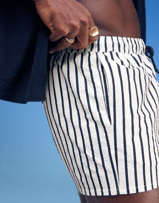 ASOS DESIGN seersucker swim shorts in short length in black and white stripe, 2 of 4
