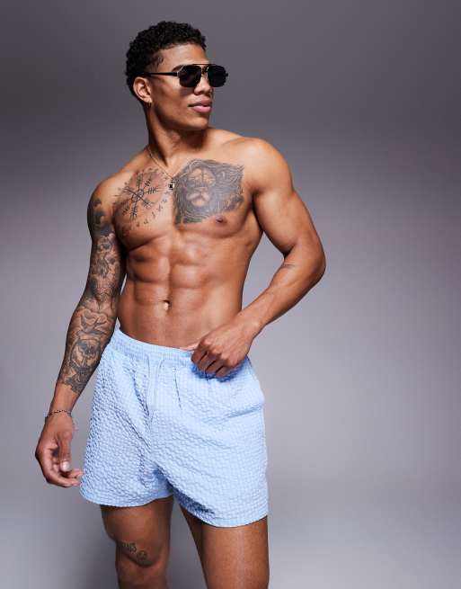 ASOS DESIGN seersucker swim shorts in short length in blue check