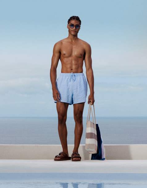 ASOS DESIGN seersucker swim shorts in short length in blue plaid - view 1