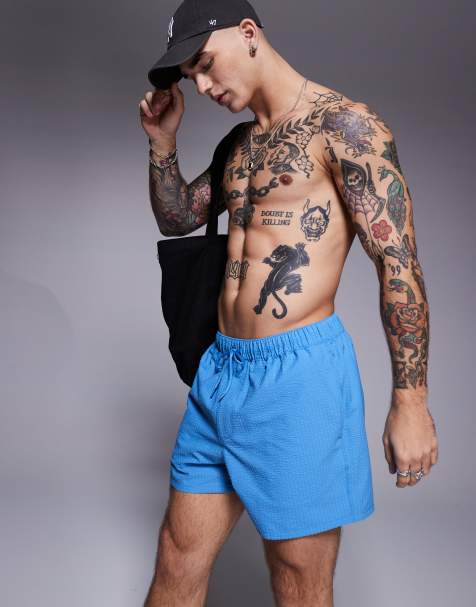 ASOS DESIGN seersucker swim shorts in short length in blue - view 1
