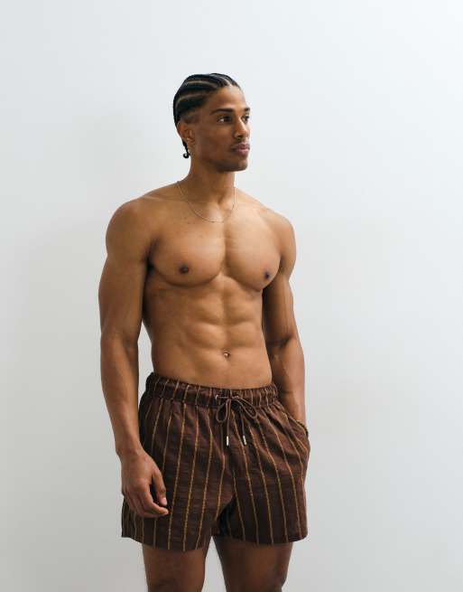 ASOS DESIGN seersucker swim shorts in short length in brown stripe, 3 of 5