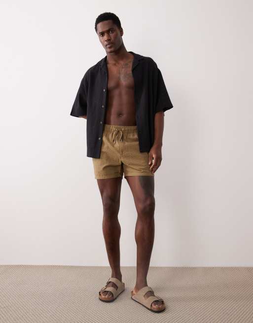 ASOS DESIGN seersucker swim shorts in short length in brown, 2 of 5