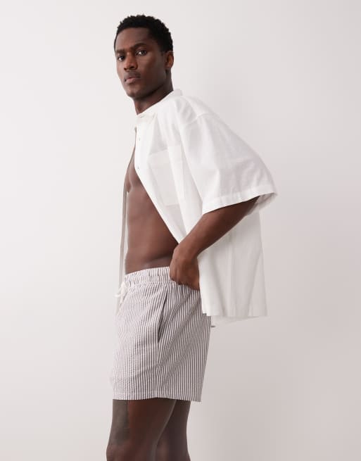 ASOS DESIGN seersucker swim shorts in short length in burgundy stripe, 3 of 5