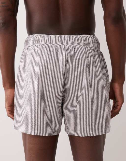 ASOS DESIGN seersucker swim shorts in short length in burgundy stripe, 5 of 5