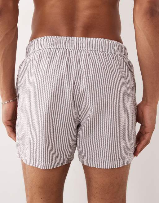 ASOS DESIGN seersucker swim shorts in short length in burgundy stripe, 5 of 5