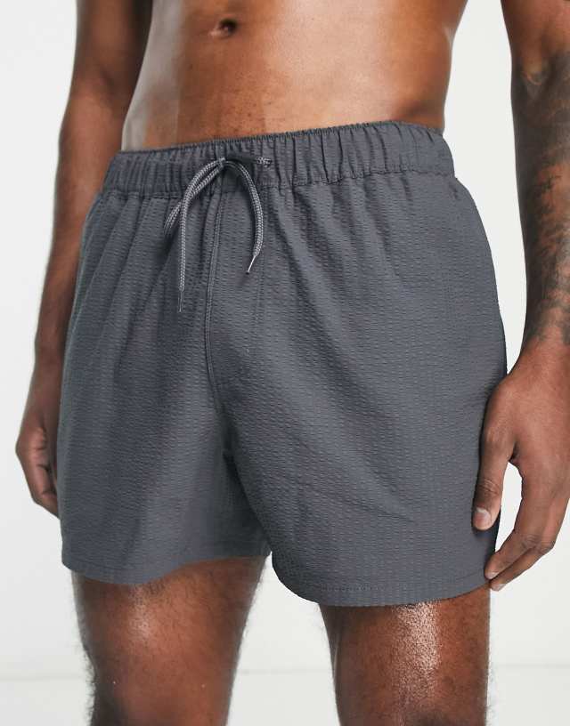 ASOS DESIGN seersucker swim shorts in short length in charcoal