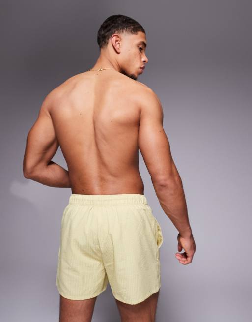 ASOS DESIGN seersucker swim shorts in short length in green (part of a set)