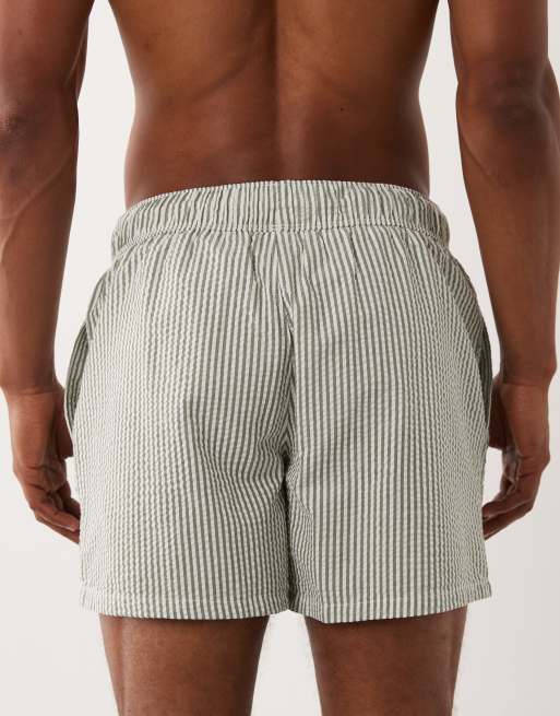 ASOS DESIGN seersucker swim shorts in short length in green stripe, 5 of 5